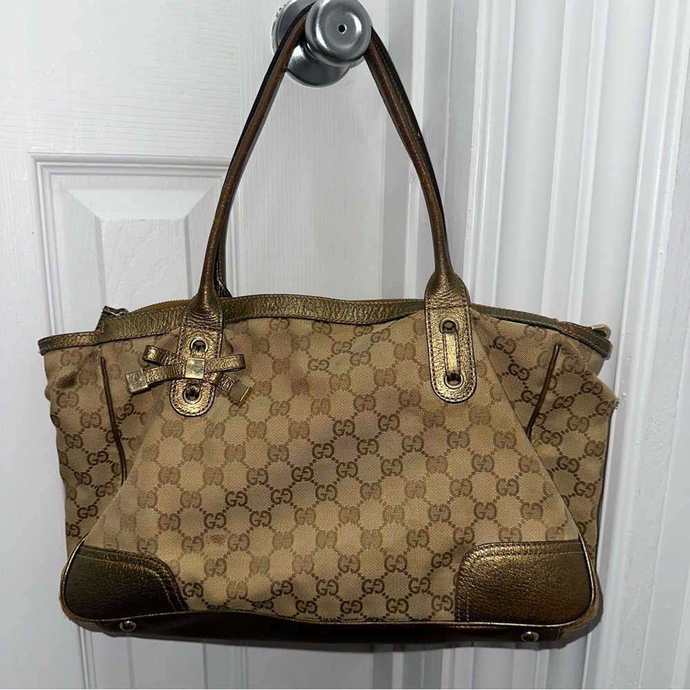 Gucci Princy Leather Handbag Gucci Gold Leather with GG Logo Interior